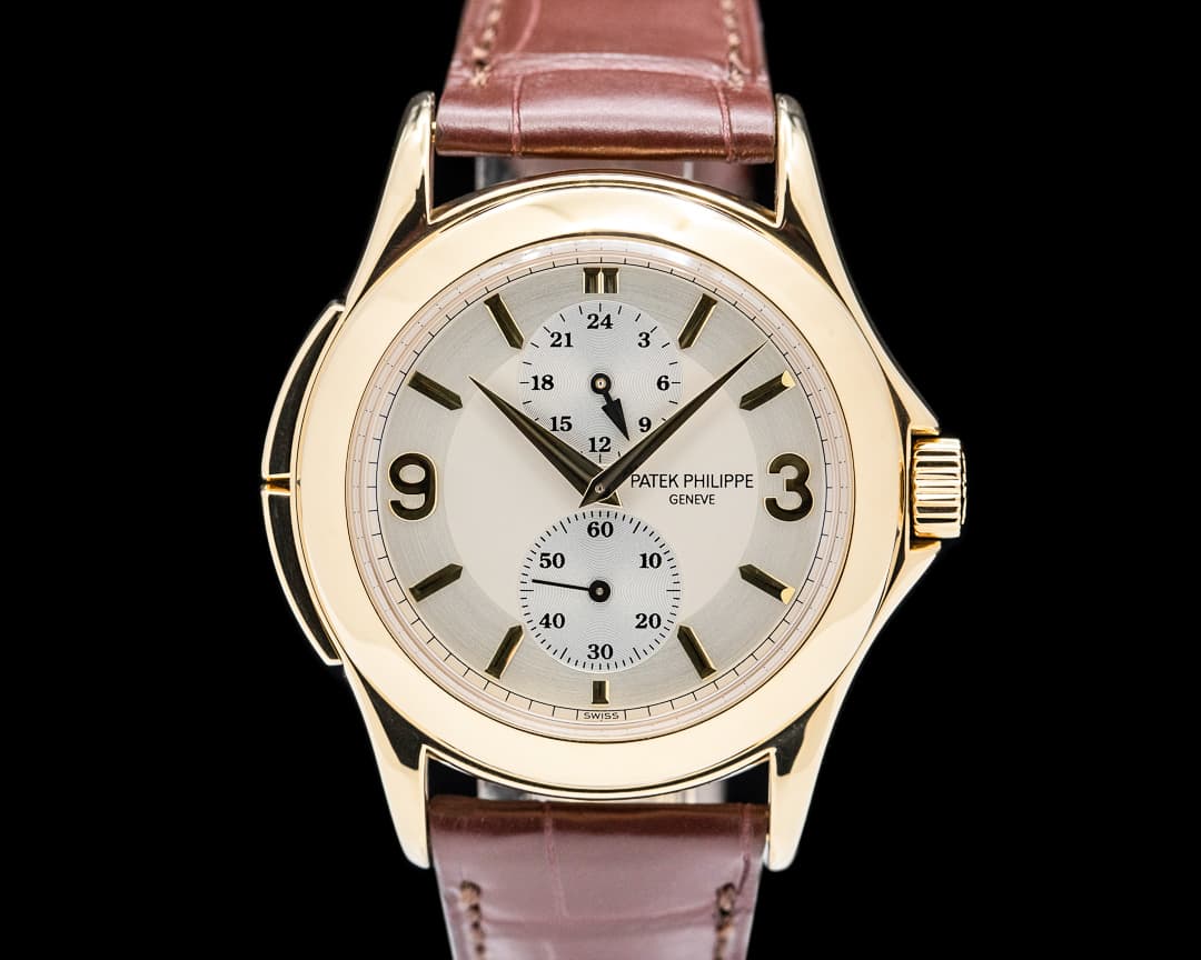 Patek Philippe Travel Time 18K Yellow Gold Manual Wind