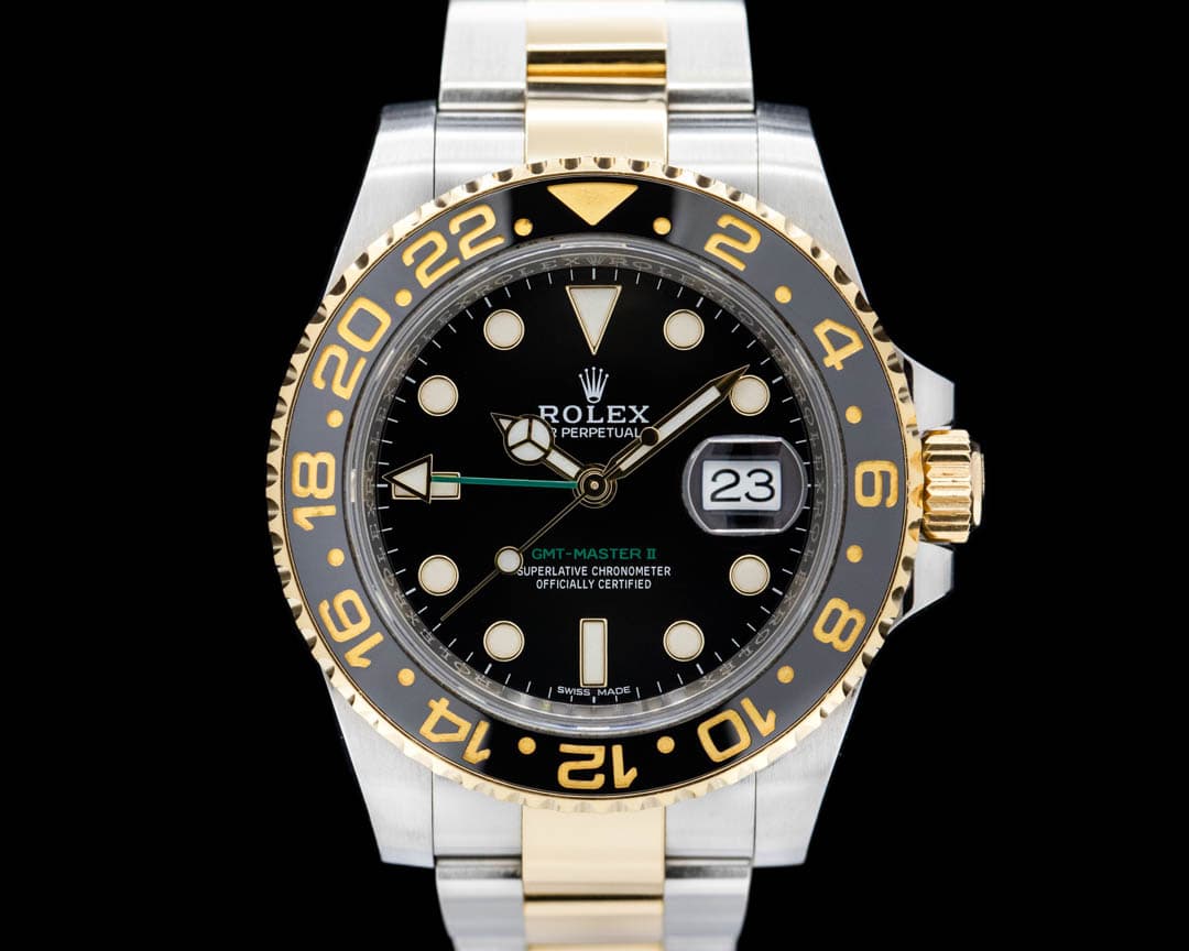 Rolex GMT Master II 116713LN SS / 18K Yellow Gold Black Dial