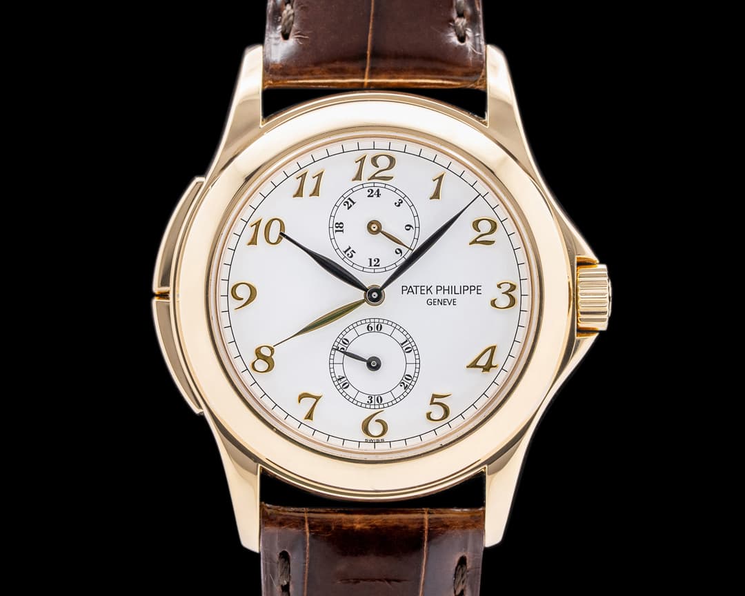Patek Philippe Travel Time 18K Yellow Gold / Breguet Numerals
