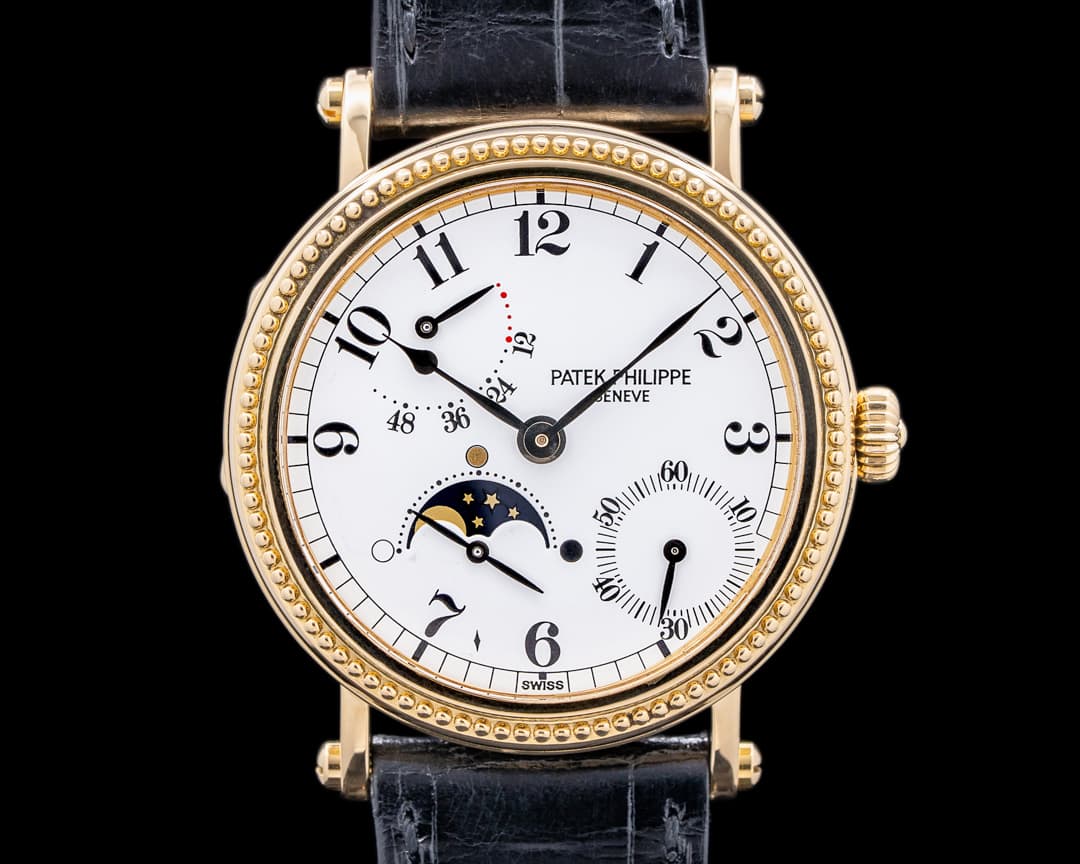 Patek Philippe Moonphase 5015J Power Reserve 18k Yellow Gold Hobnail Bezel