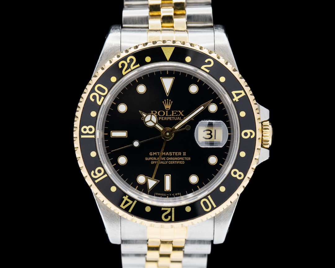 Rolex GMT Master II 16713 SS / 18K Yellow Gold Black Dial