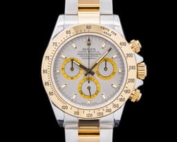 Daytona 116523 18K Yellow Gold / SS Gray Dial