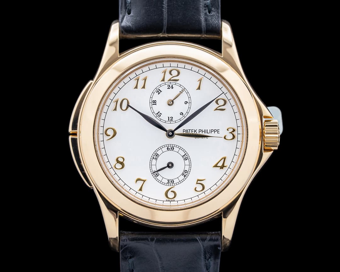 Patek Philippe 5134J Travel Time 18K Yellow Gold Breguet Numerals White Dial