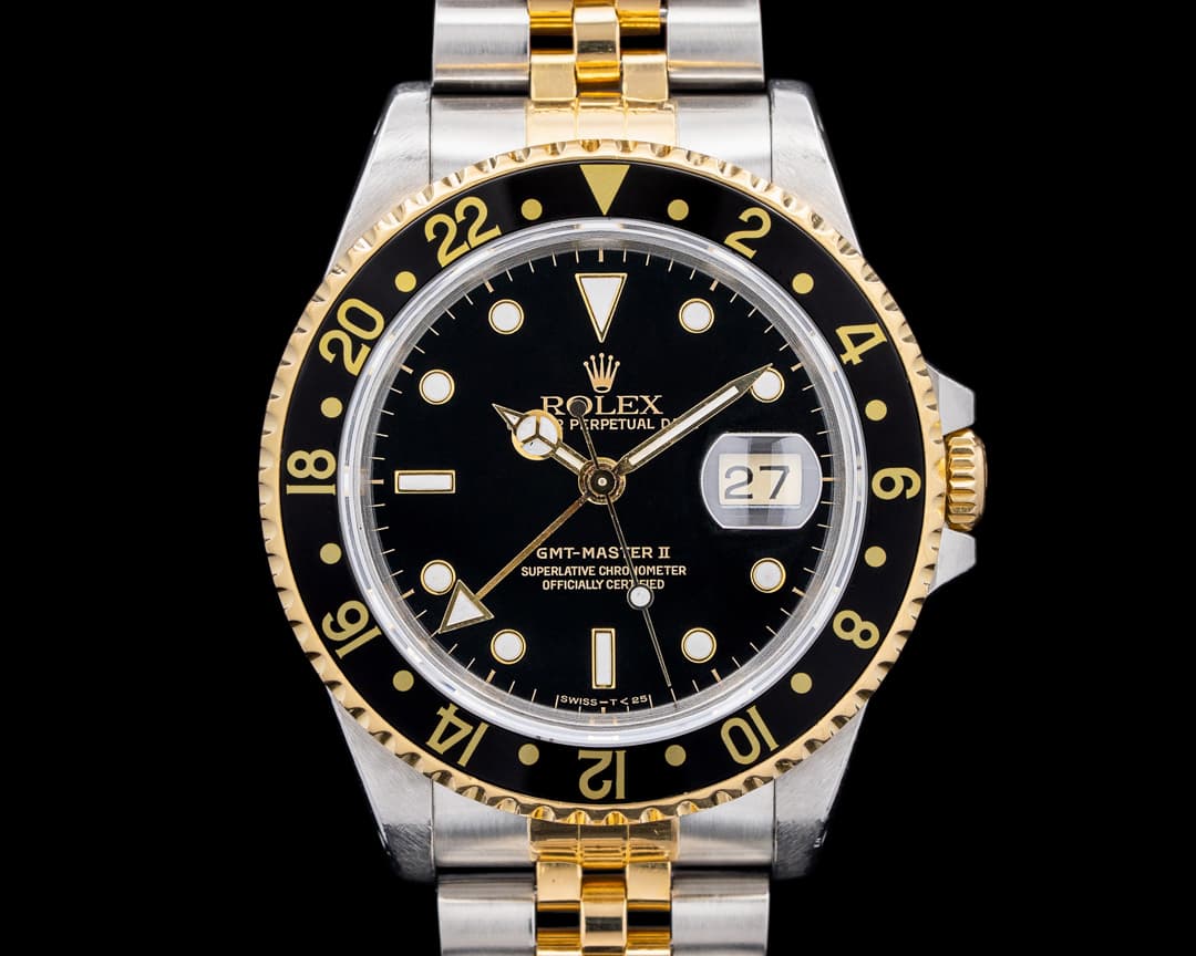 Rolex GMT Master II 16713 SS / 18K Yellow Gold Black Dial