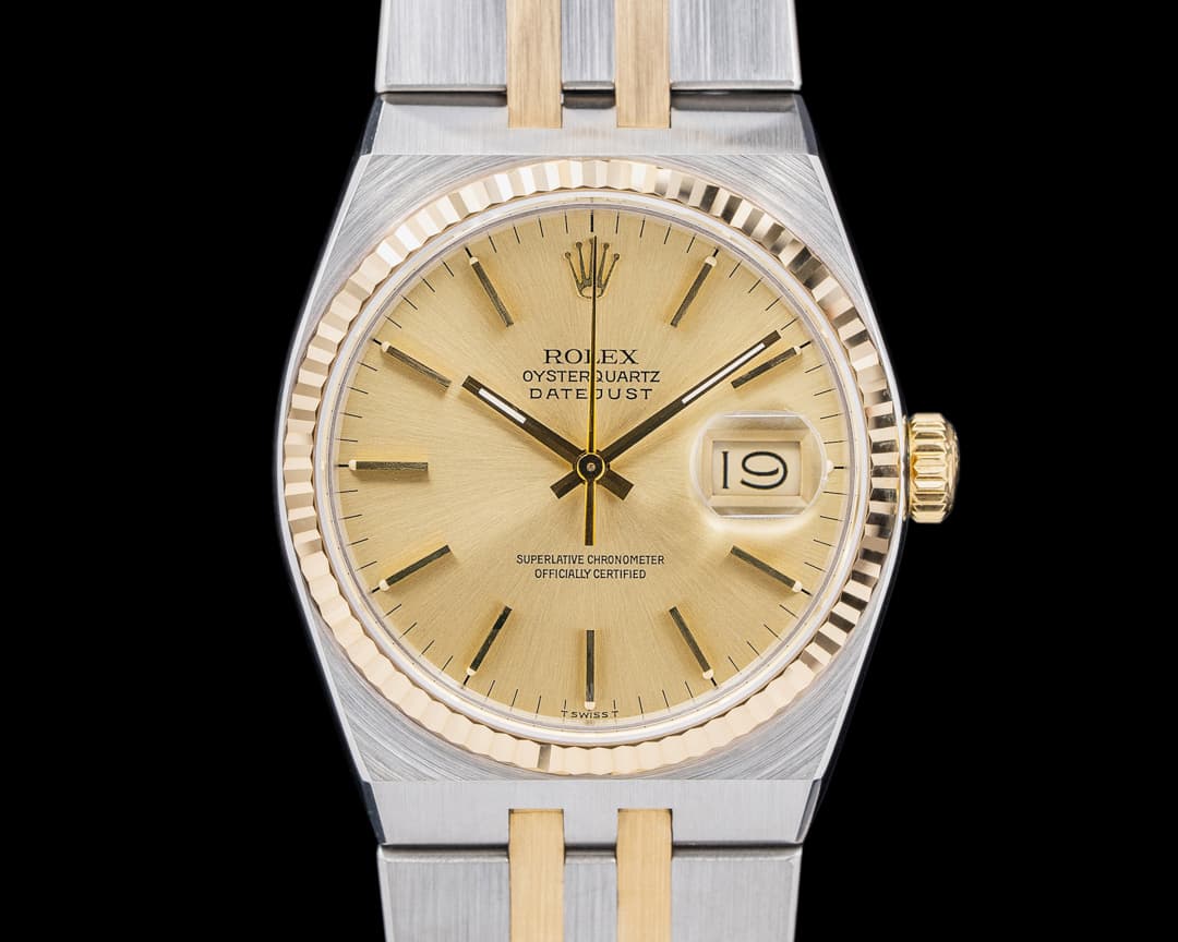 Rolex 17013 Datejust Oysterquartz SS / 18K Yellow Gold Champagne Dial