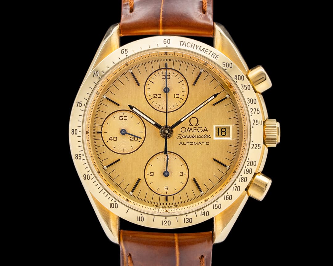 Omega 3111.1 Speedmaster Automatic 18k Yellow Gold Champagne Dial