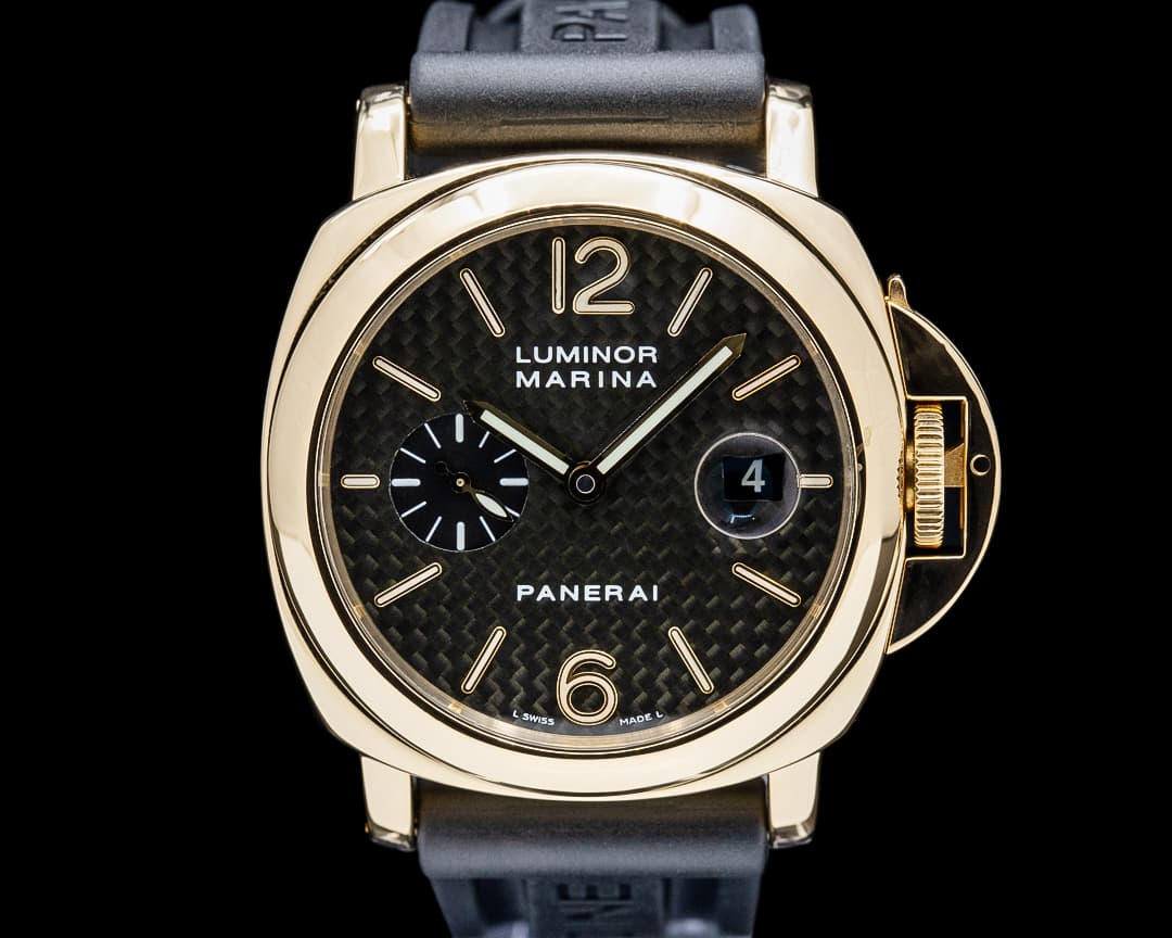 Panerai PAM00140 Luminor Marina Automatic 18K Yellow Gold Carbon Fiber Dial
