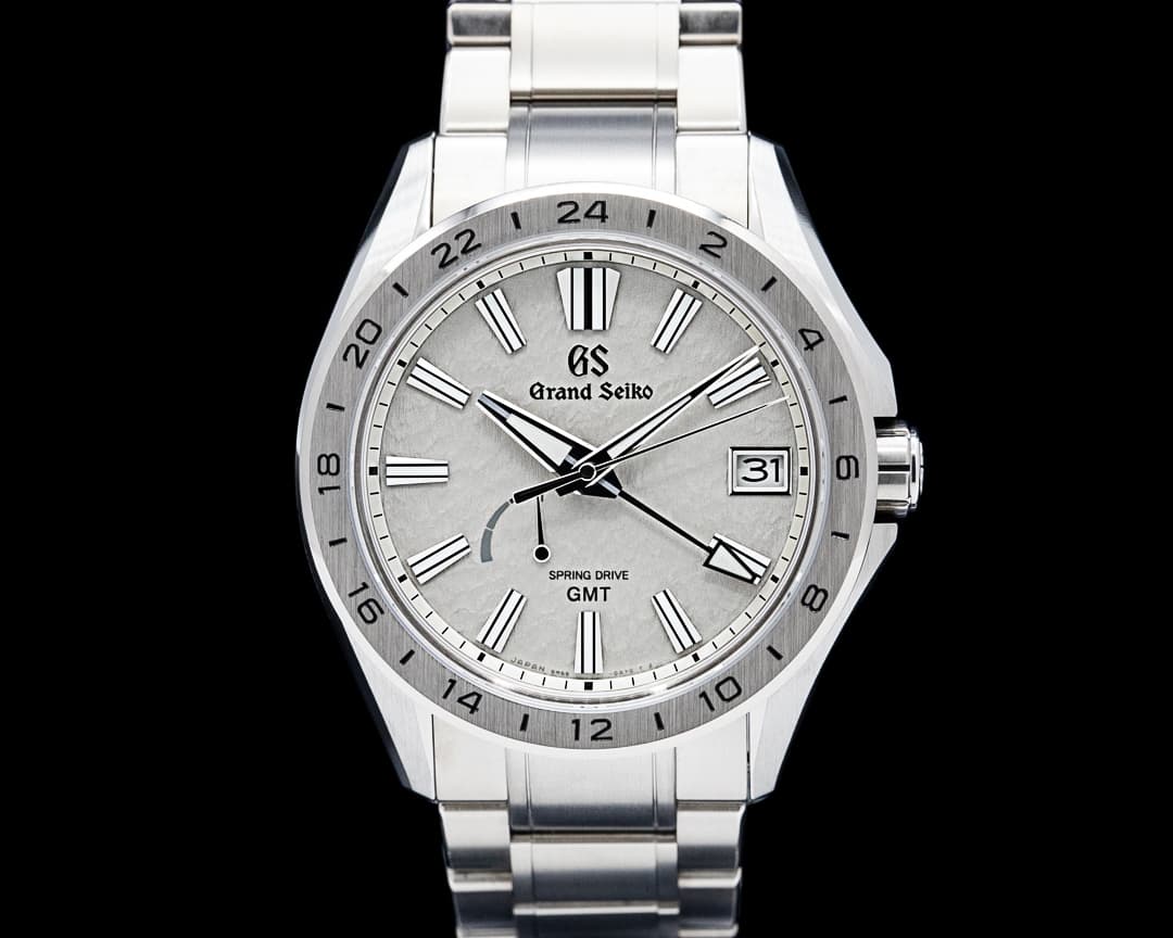 Grand Seiko SBGE285 Evolution 9 GMT Spring Drive Titanium Gray Dial