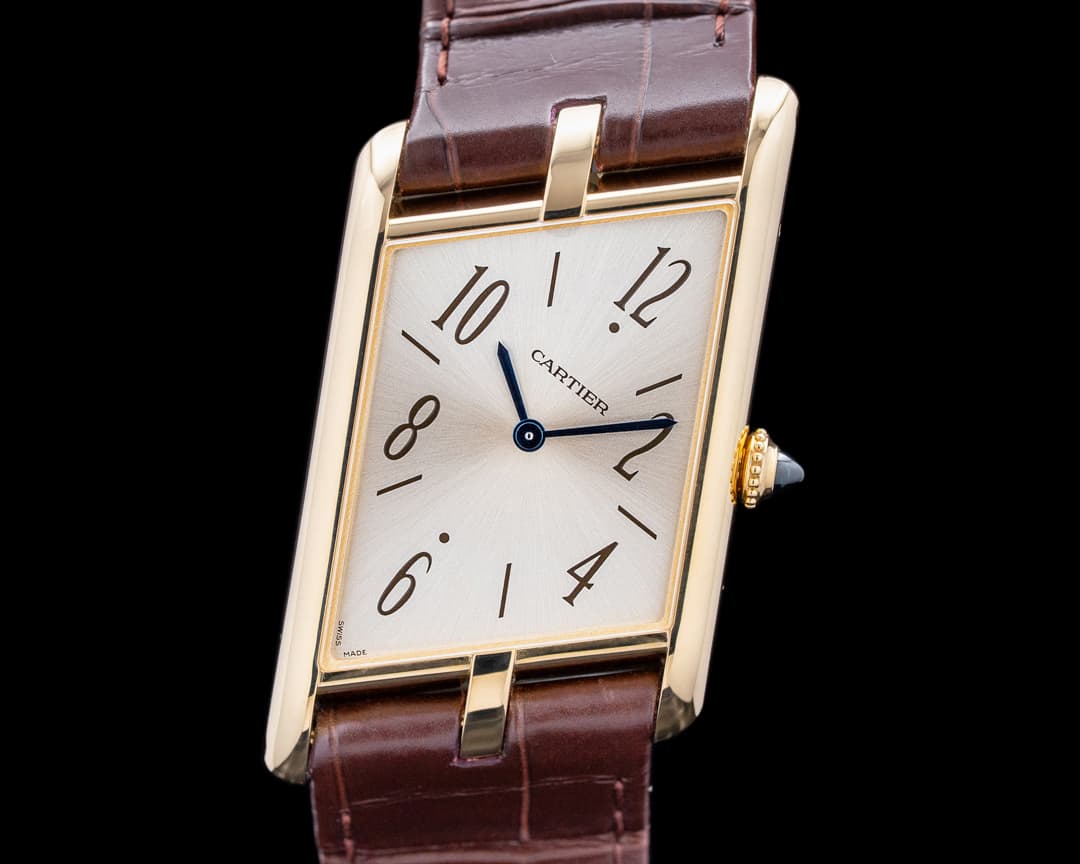 Cartier WGTA0044 Tank Asymetrique 18K Yellow Gold Champagne Dial