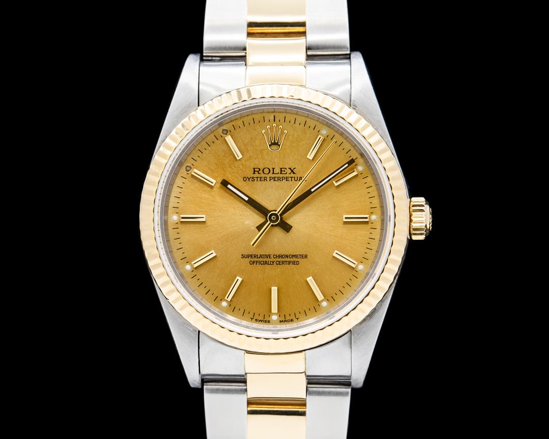 Image of Rolex 14233 Oyster Perpetual 18K Yellow Gold / SS Champagne Dial Circa. 1993