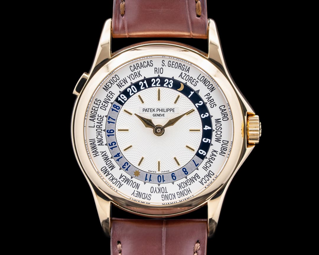 Patek Philippe 5110J World Time 18K Yellow Gold Silver Dial