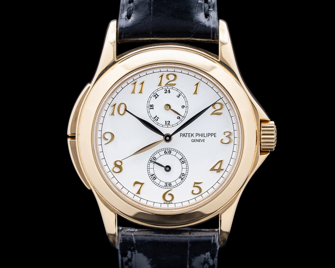 Patek Philippe 5134J-001 Travel Time 18K Yellow Gold White Dial