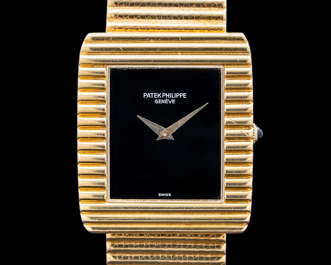 Image of Patek Philippe 3733/1J Gondolo 18K Yellow Gold Black Onyx Dial