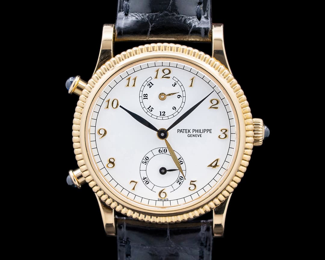 Patek Philippe 4864J Calatrava Travel Time 18K Yellow Gold White Dial