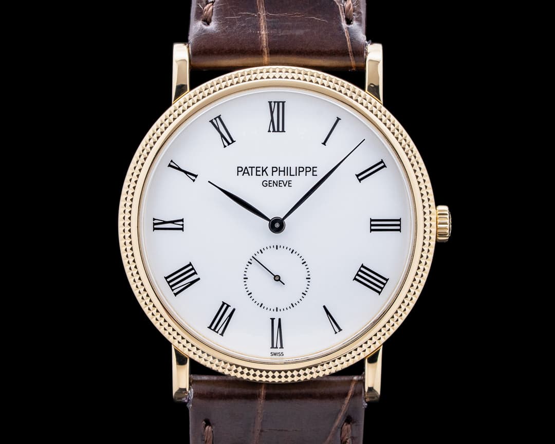 Patek Philippe 5119J-001 Calatrava Manual Wind 18K Yellow Gold White Dial