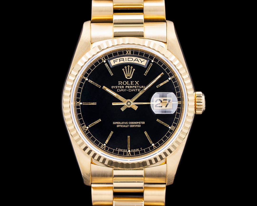Rolex 18238 Day Date 18K Yellow Gold Black Dial Circa. 1999