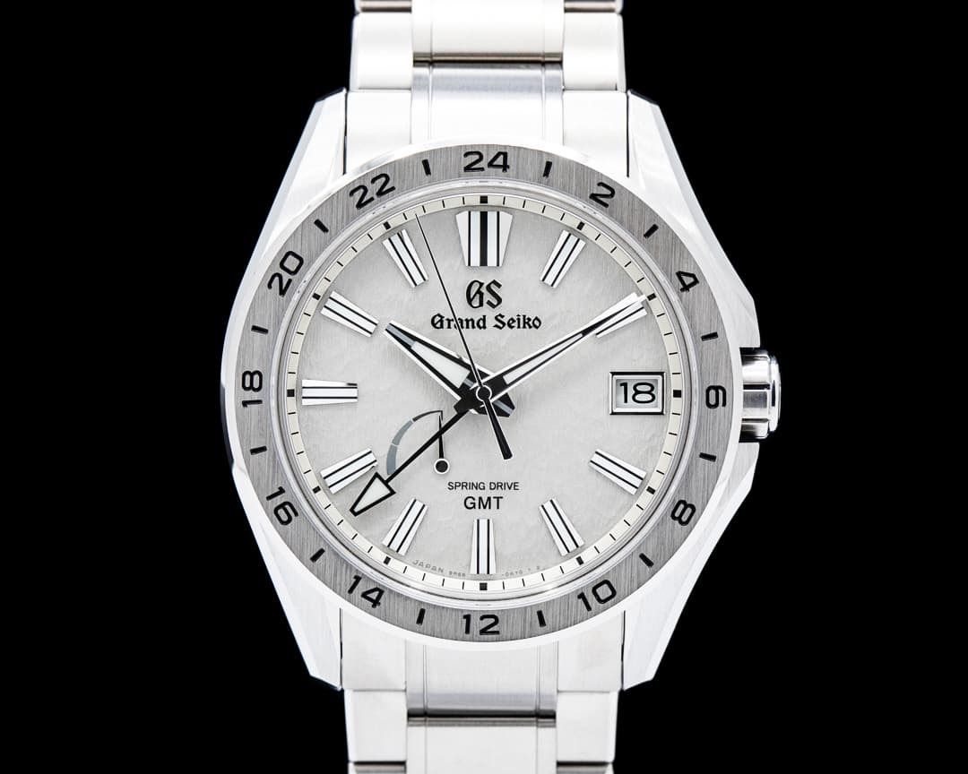 Grand Seiko SBGE285 Evolution 9 GMT Spring Drive Titanium Gray Dial