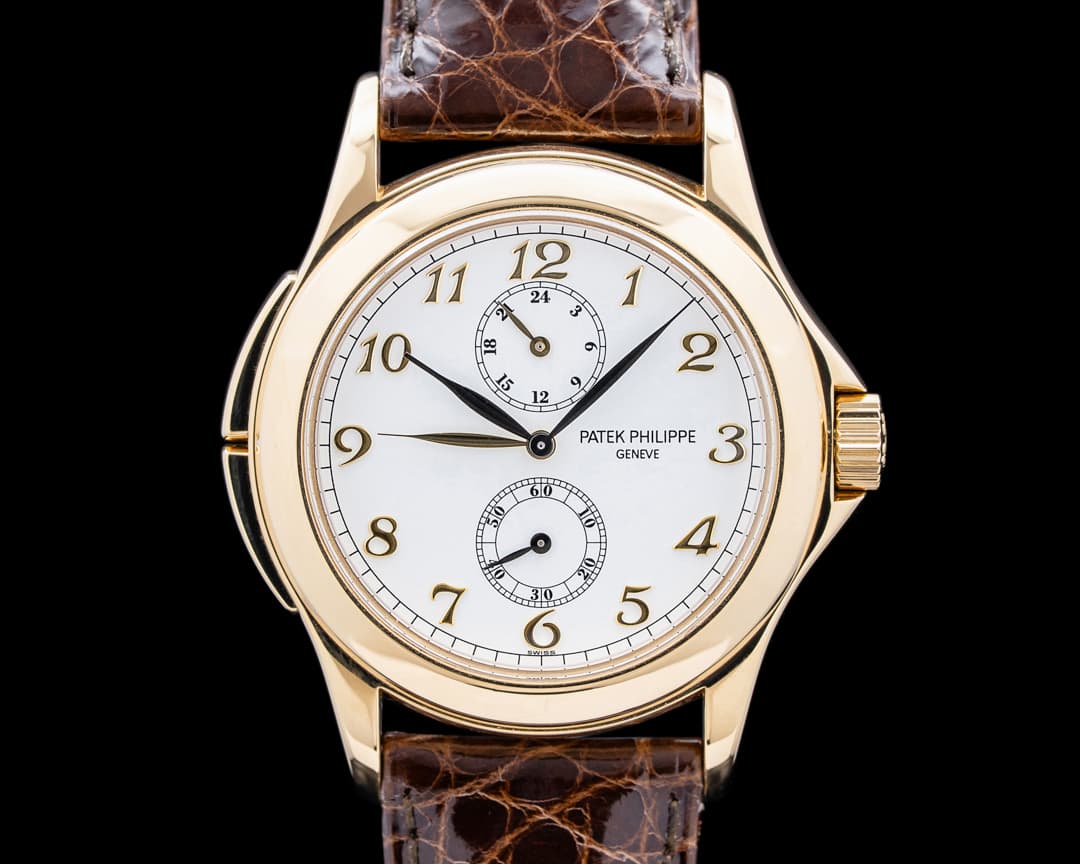 Patek Philippe 5134J-001 Travel Time 18K Yellow Gold White Dial