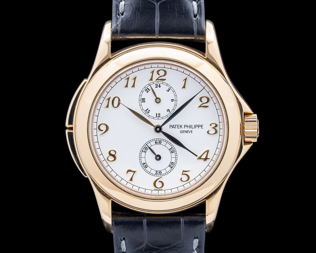Patek Philippe 5134J-001 Travel Time 18K Yellow Gold White Dial