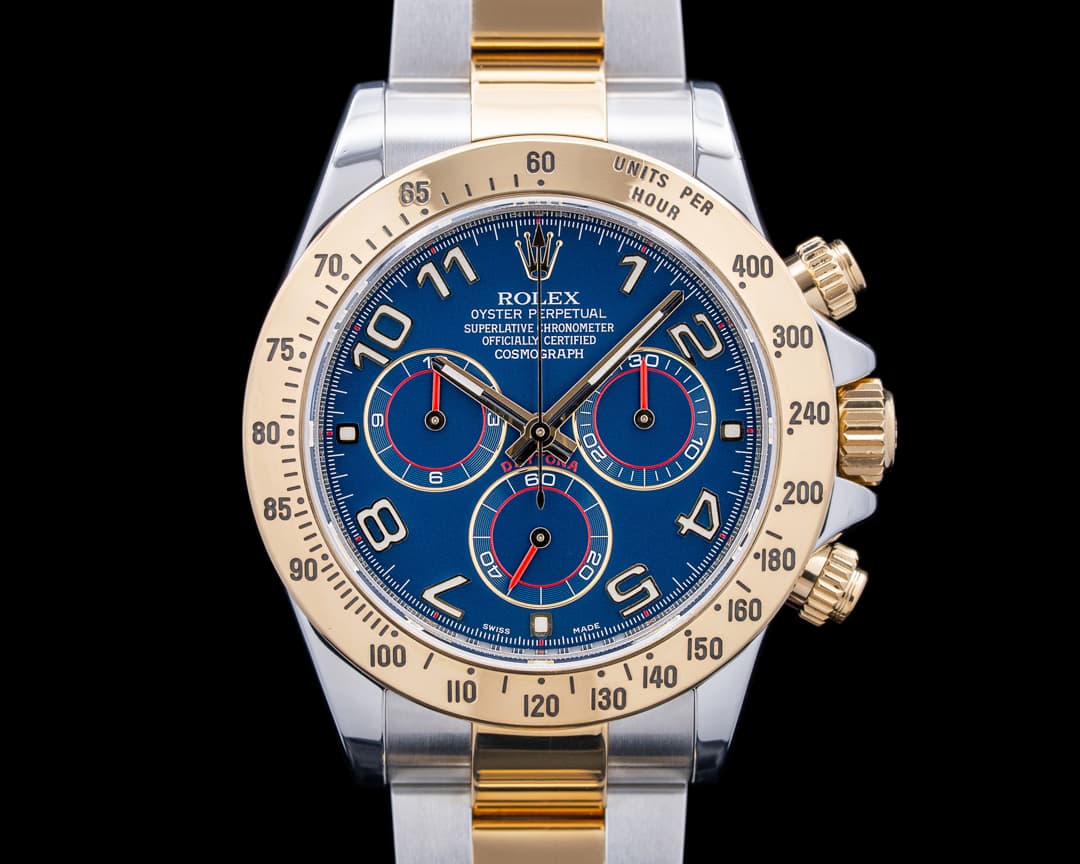 Rolex 116523 Daytona 18K Yellow Gold / SS Blue Arabic Racing Dial