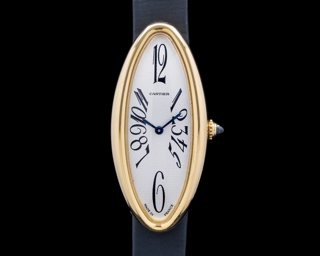 Cartier W1534636 Baignoire Allongee 18K Yellow Gold Silver Dial