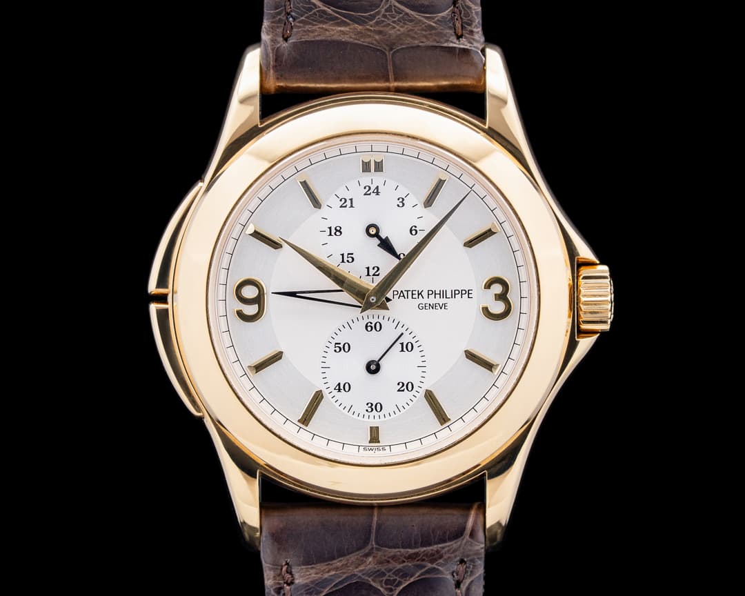 Image of Patek Philippe 5134J-011 Calatrava Travel Time 18K Yellow Gold Silver Dial