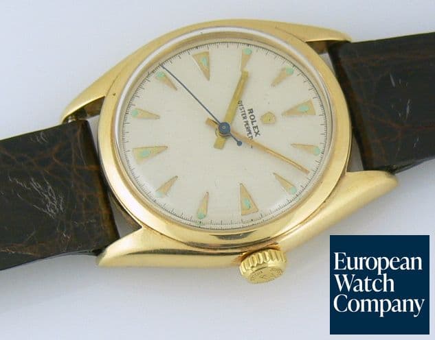 Image of Rolex Oyster Perpetual
14k on strap 
"BIG BUBBLE BACK"