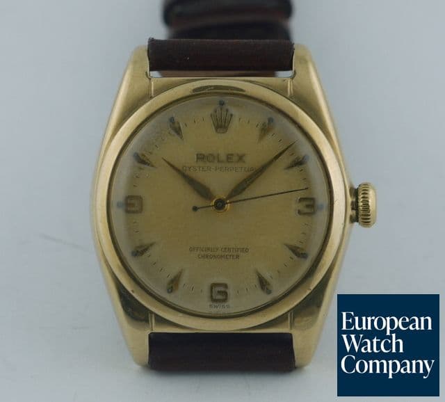 Image of Rolex Oyster Perpetual
10k on strap 
"BUBBLE BACK"