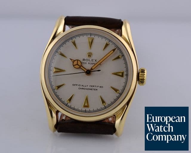 Image of Rolex Bombay Bubble Back Cream Dial 14K Yellow Gold Circa 1950 33MM
