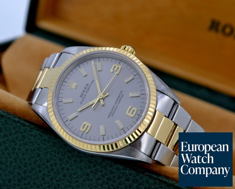 Image of Rolex Oyster Perpetual Silver Dial Arabic Numerals 18K Yellow Gold / SS
