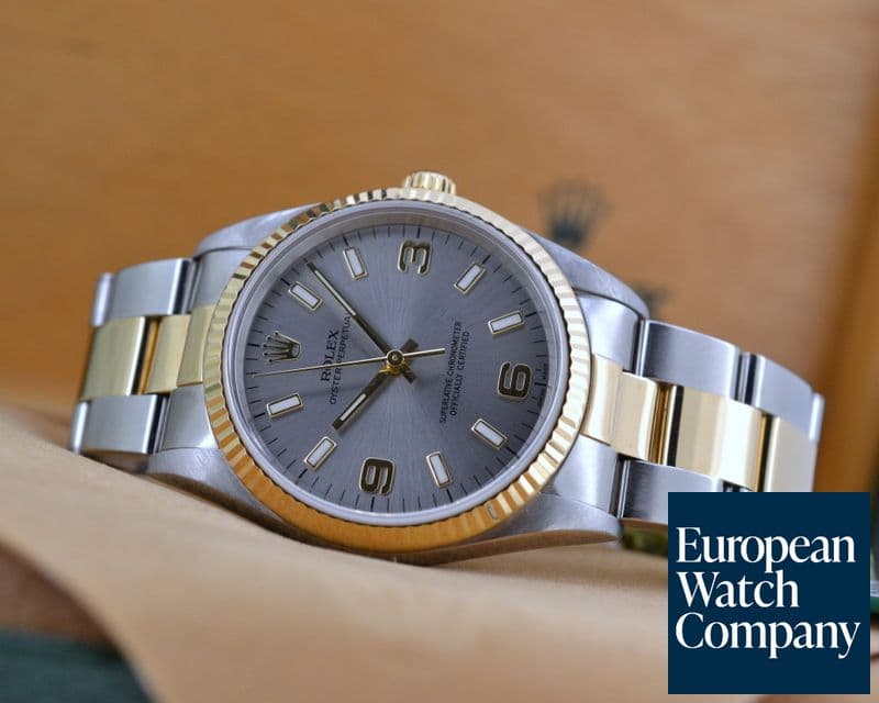 Image of Rolex Oyster Perpetual Silver Dial Arabic Numerals 18K Yellow Gold / SS