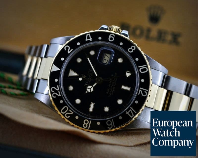 Image of Rolex GMT Master Black Dial Oyster 18K / SS 