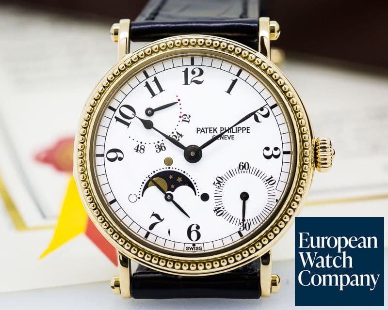 Image of Patek Philippe Moonphase Power Reserve 18K Yellow Gold Hobnail Bezel 