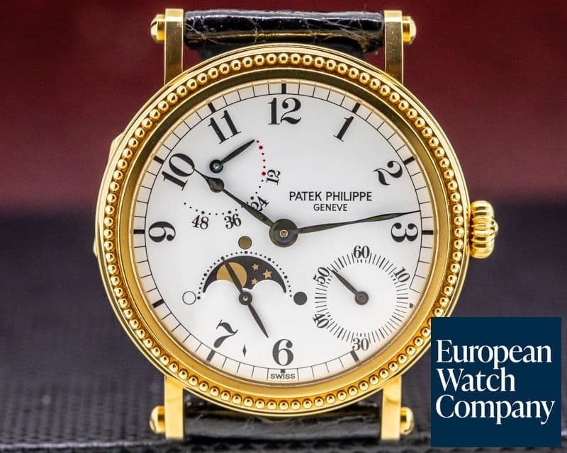 Image of Patek Philippe Moonphase Power Reserve 18k Yellow Gold Hobnail Bezel 