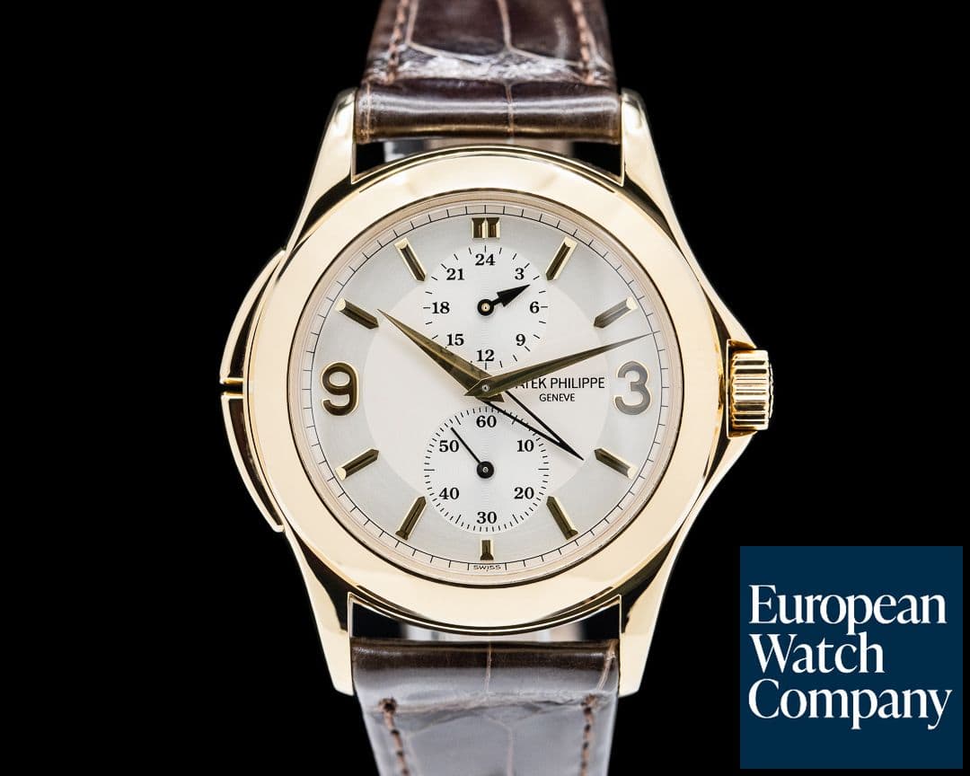 Image of Patek Philippe Travel Time 18K Yellow Gold Manual Wind Deployant