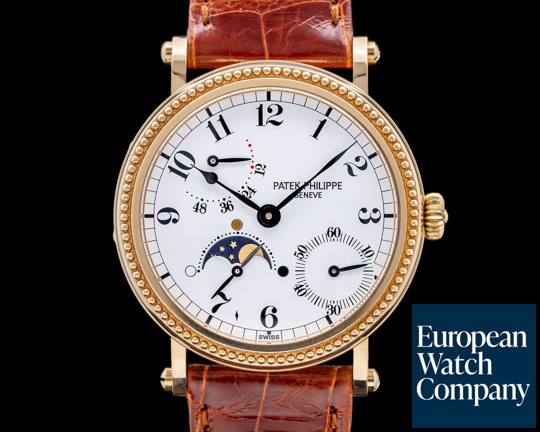 Image of Patek Philippe Moonphase 5015J Power Reserve 18k Yellow Gold Hobnail Bezel 
