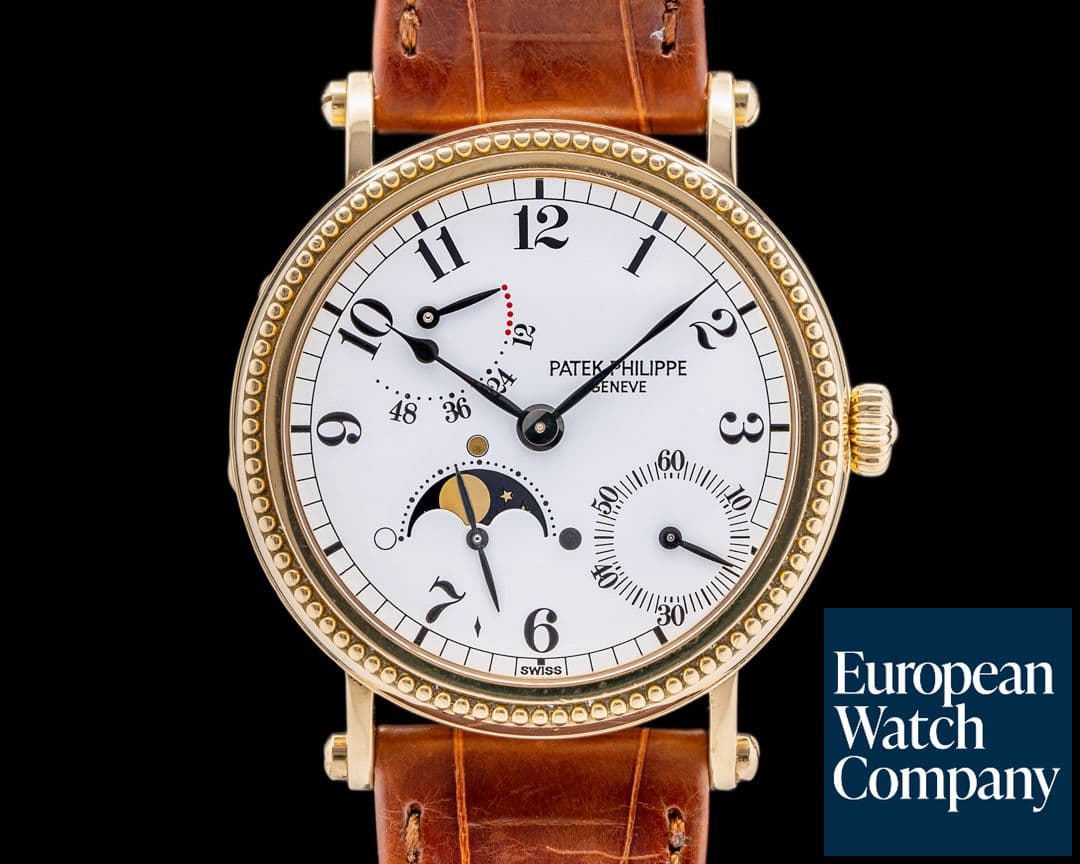 Image of Patek Philippe Moonphase 5015J Power Reserve 18k Yellow Gold Hobnail Bezel