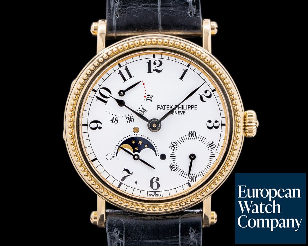 Image of Patek Philippe Moonphase 5015J Power Reserve 18k Yellow Gold Hobnail Bezel