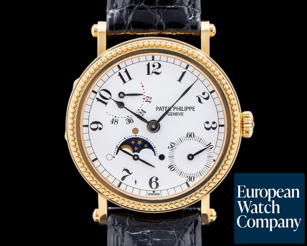 Image of Patek Philippe Moonphase 5015J Power Reserve 18k Yellow Gold Hobnail Bezel