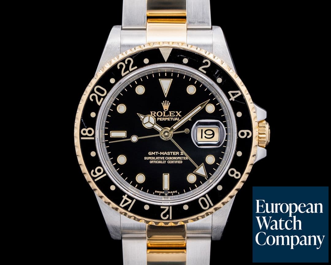 Image of Rolex GMT Master II 16713 SS / 18K Yellow Gold Black Dial