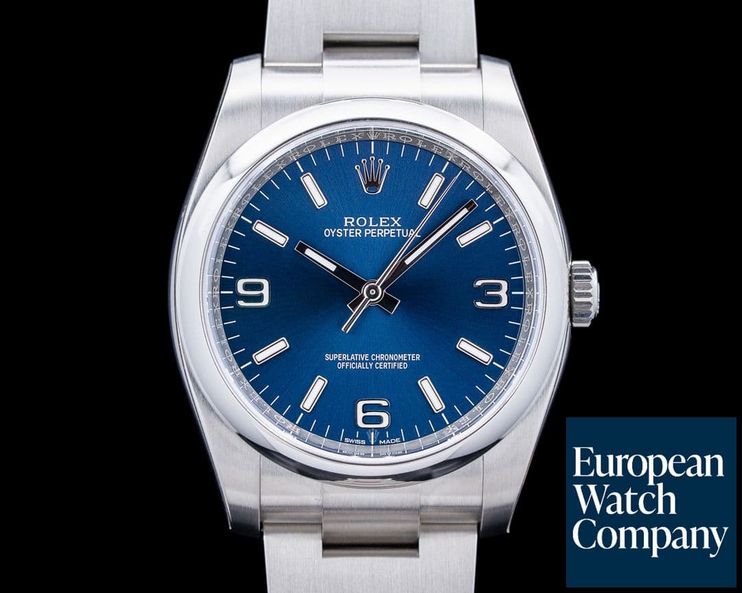 Image of Rolex 116000 Oyster Perpetual SS Blue Dial UNWORN
