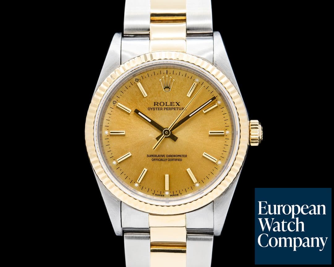 Image of Rolex 14233 Oyster Perpetual 18K Yellow Gold / SS Champagne Dial Circa. 1993
