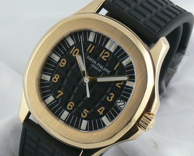 Patek Philippe Large Aquanaut 5065
18k YG/Rubber