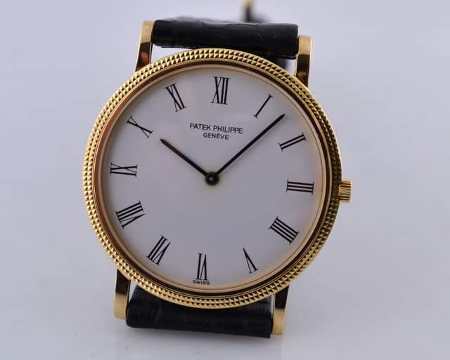 Patek Philippe Calatrava 18K Yellow Gold White Roman Manual 32.2MM