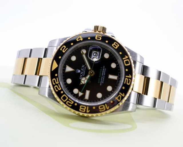 Rolex GMT Master II SS / 18K Yellow Gold Black Dial