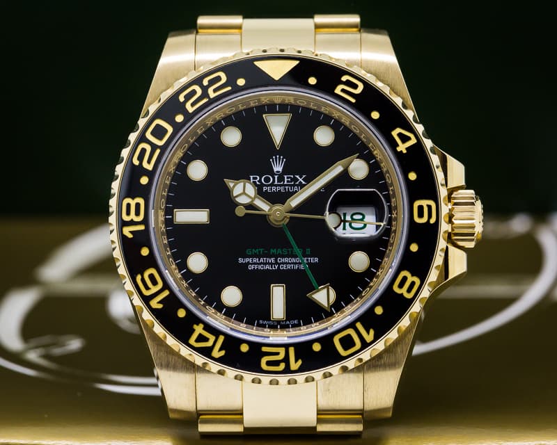 Rolex GMT Master II Black Dial 18K Yellow Gold / Bracelet