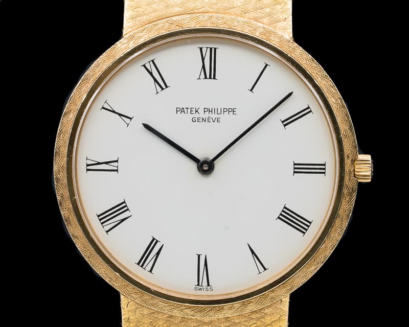 Patek Philippe Calatrava 18K Yellow Gold Manual Wind White Roman Dial