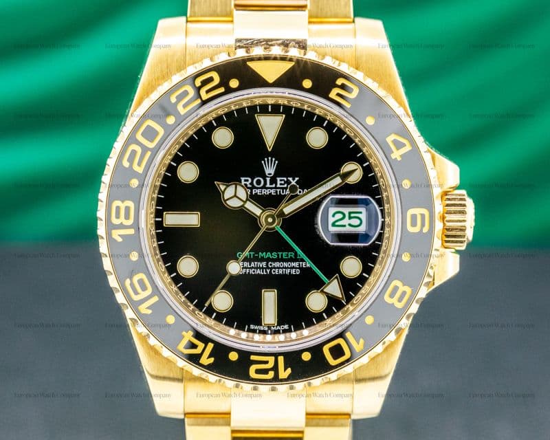Rolex GMT Master II 116718 Black Dial 18K Yellow Gold / Bracelet