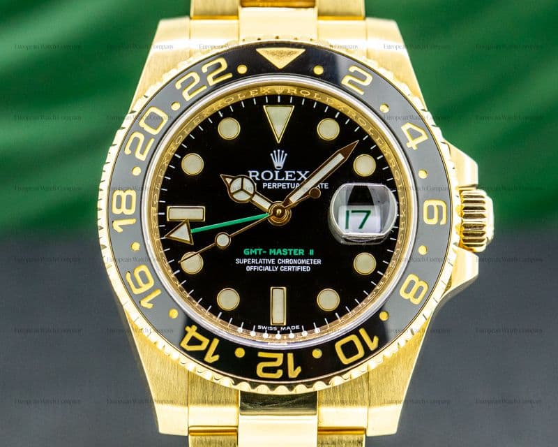 Rolex GMT Master II Black Dial 18K Yellow Gold / Bracelet