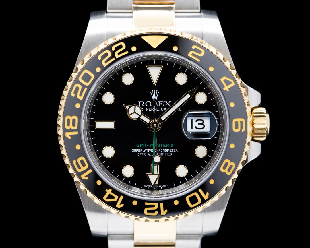 Rolex GMT Master II 116713LN SS / 18K Yellow Gold Black Dial